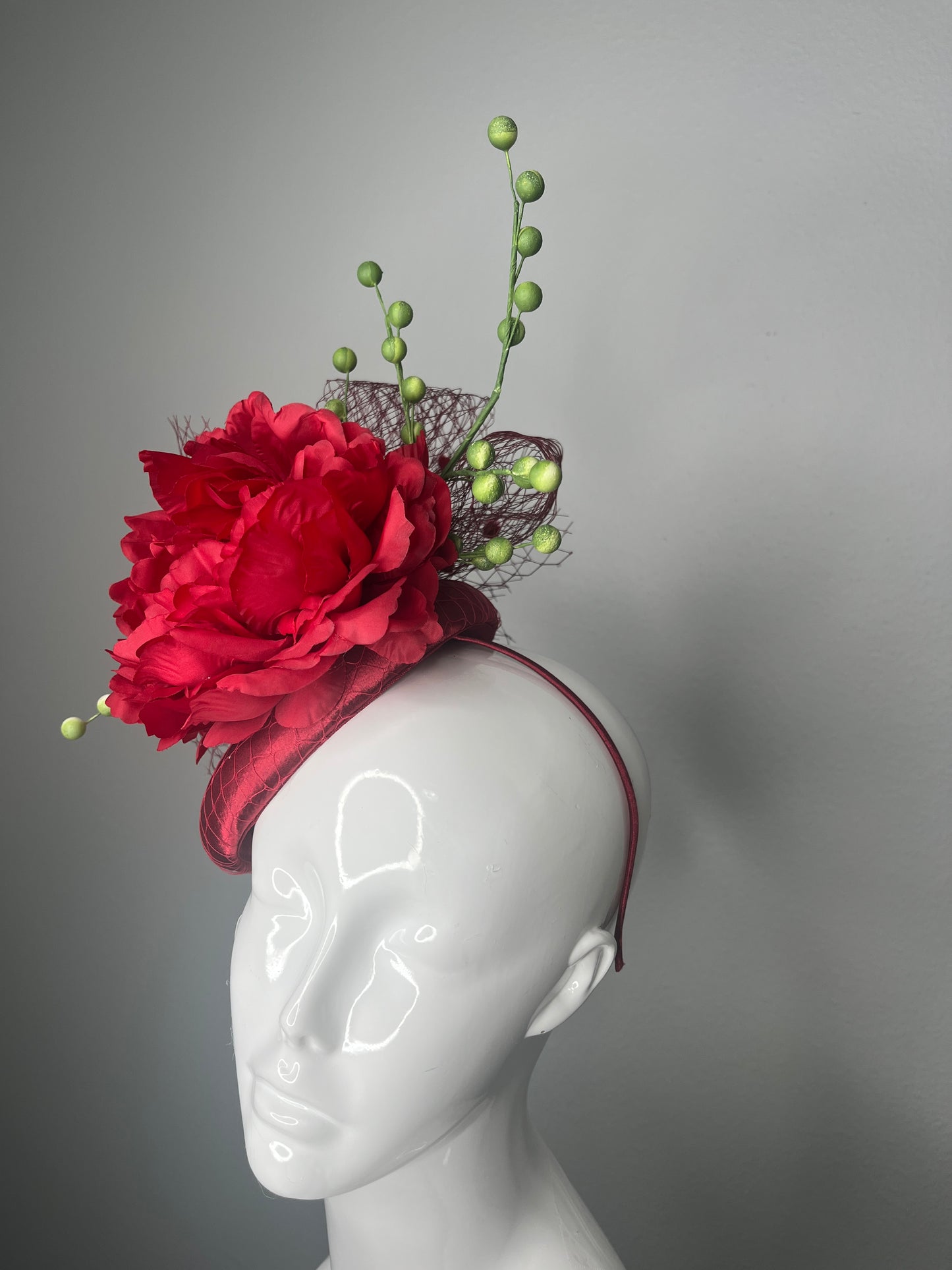 Crimson Bloom Couture Fascinator Hat with Green Berry Sprigs