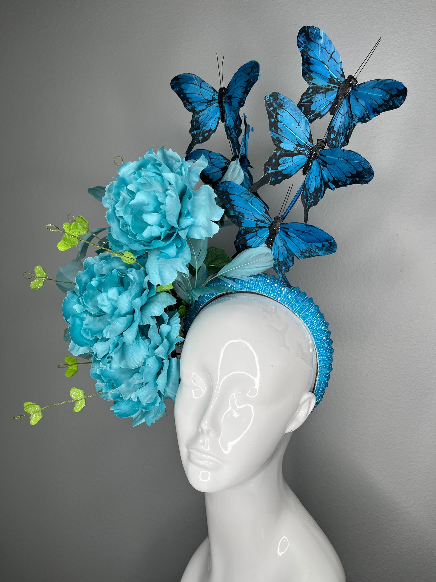 Turquoise Floral Butterfly Fascinator Headband Statement Derby Hat with Blue Butterflies Oversized Blooms