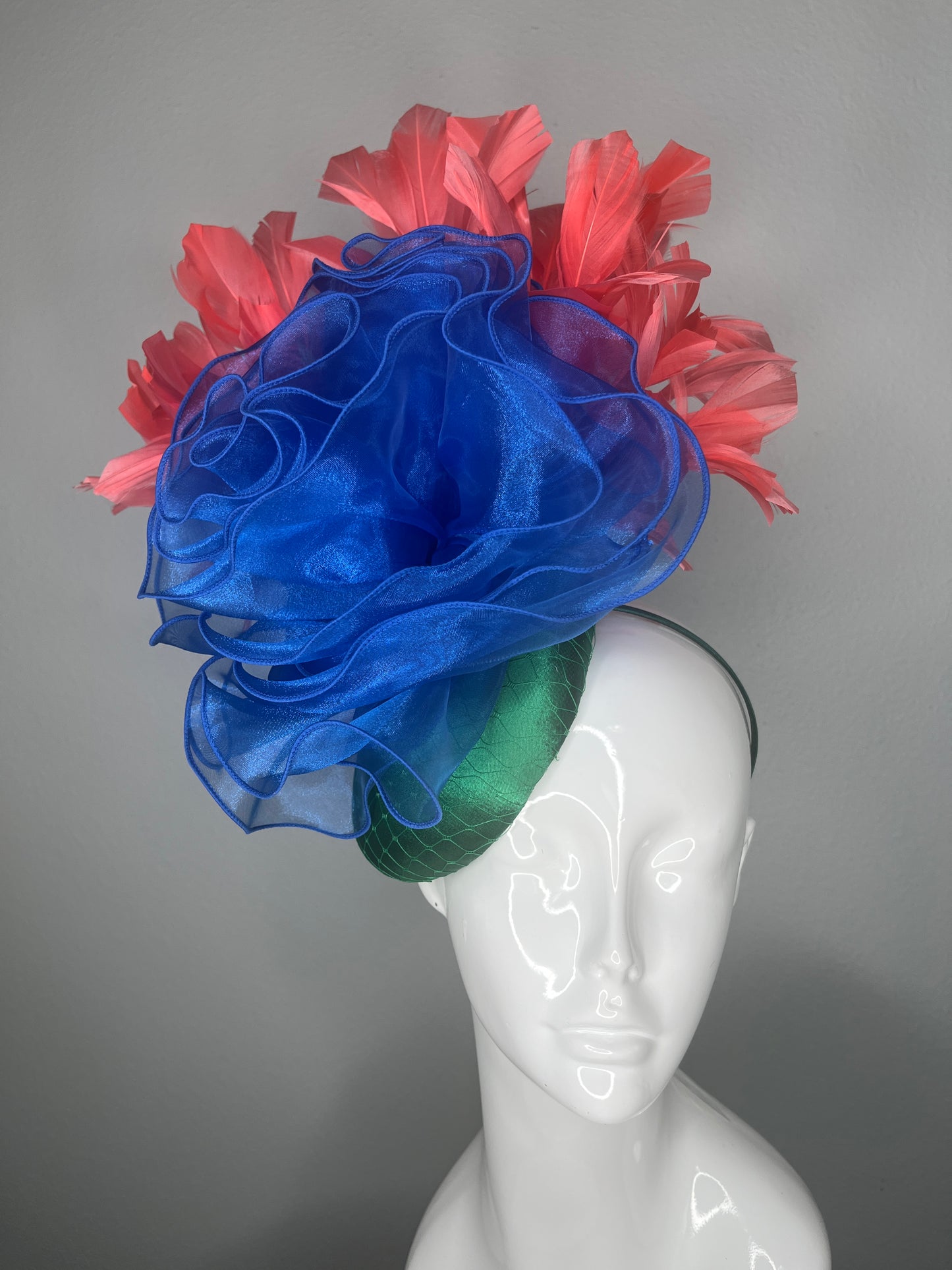 Kentucky Derby Fascinator Hat  Emerald Green Satin Base with Royal Blue Organza Flower Coral Feather Plumes