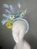 Powder Blue Fascinator Headband with Feathers Yellow and Lime Flowers and Veiling
