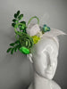 Green and White Floral Fascinator with Veiling and Glitter Leaves