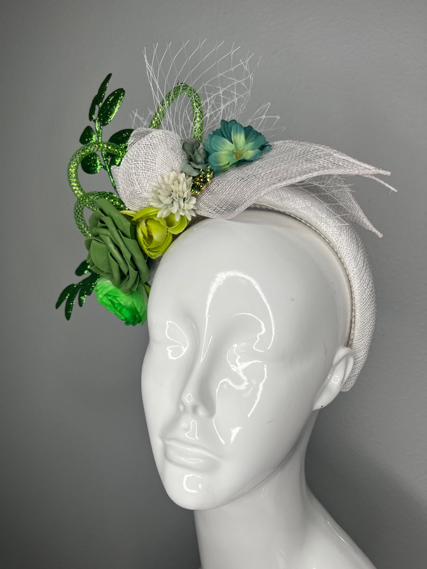 Green and White Floral Fascinator with Veiling and Glitter Leaves