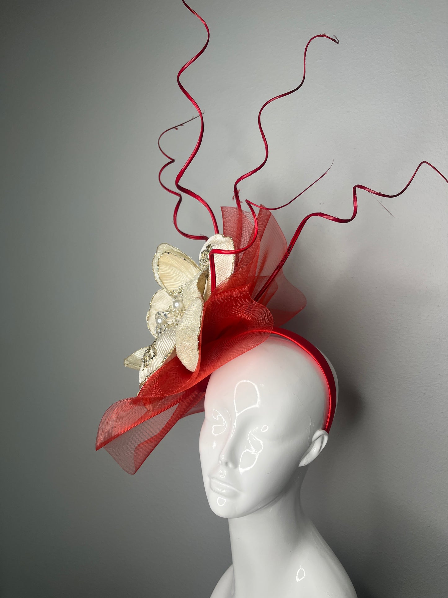 Red & Ivory Statement Fascinator with Sculpted Ribbon and Pearl Floral Accent