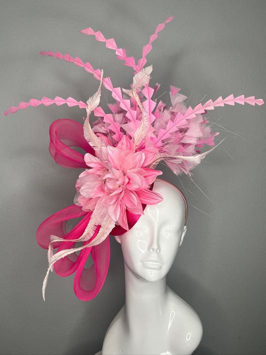Bold Pink Statement Fascinator Hat with Floral and Feather Accents