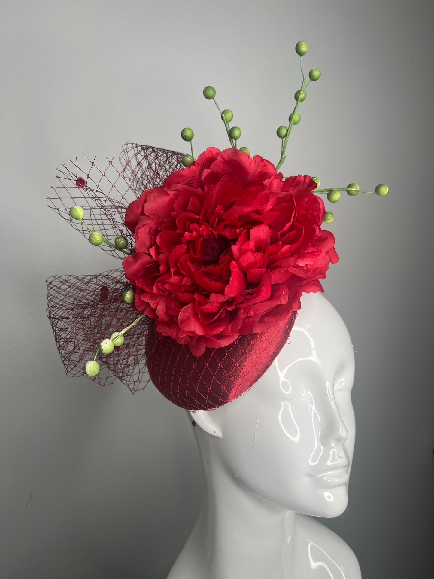 Crimson Bloom Couture Fascinator Hat with Green Berry Sprigs