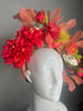 Coral Bloom Statement Fascinator with Feathers & Metallic Accents
