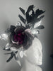Black and Silver Floral Fascinator with Sculpted Feathers and Metallic Leaf Accents